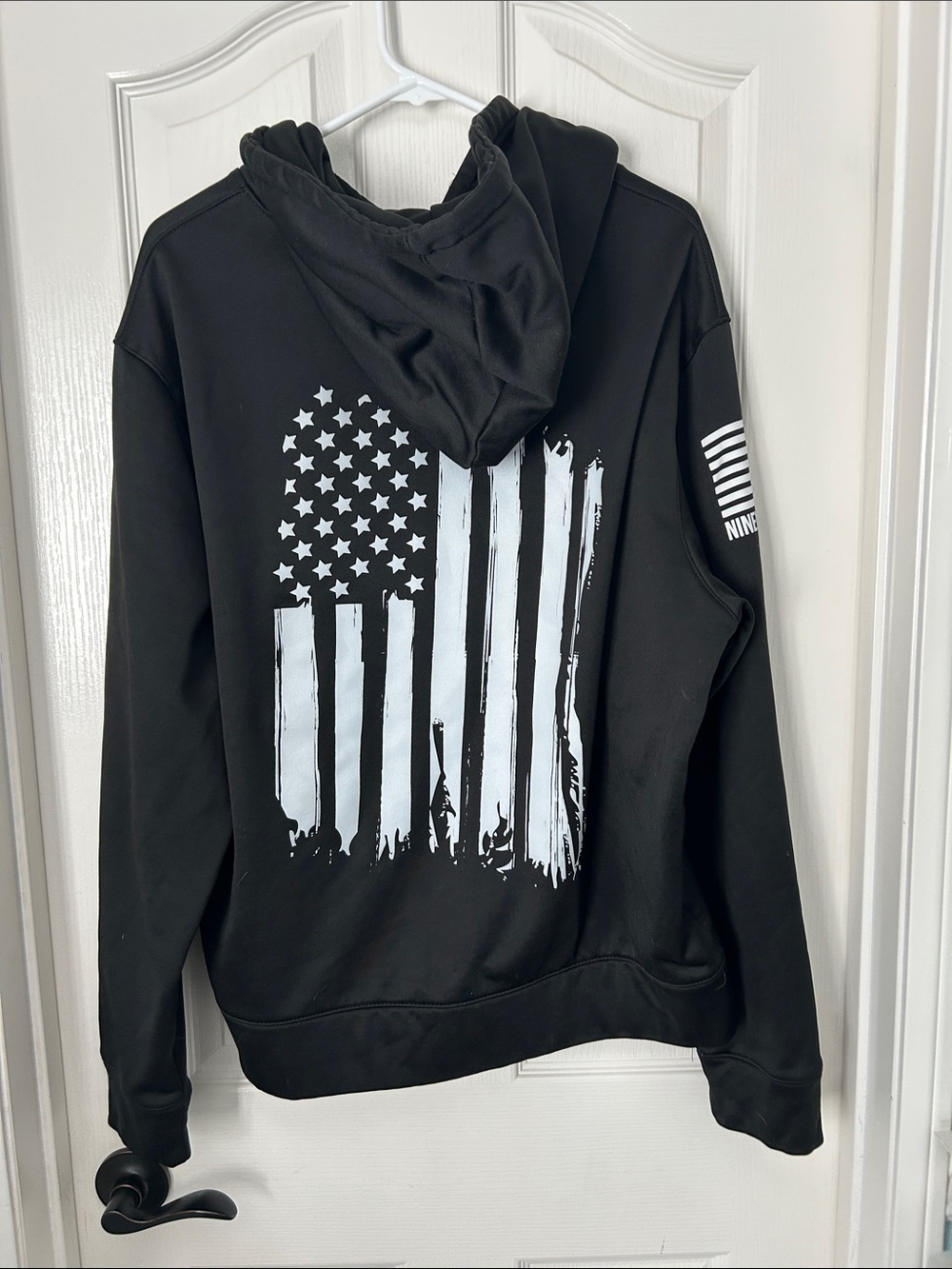 Nine-Line Patriotic Black Hoodie with White Flag Graphic, size Large